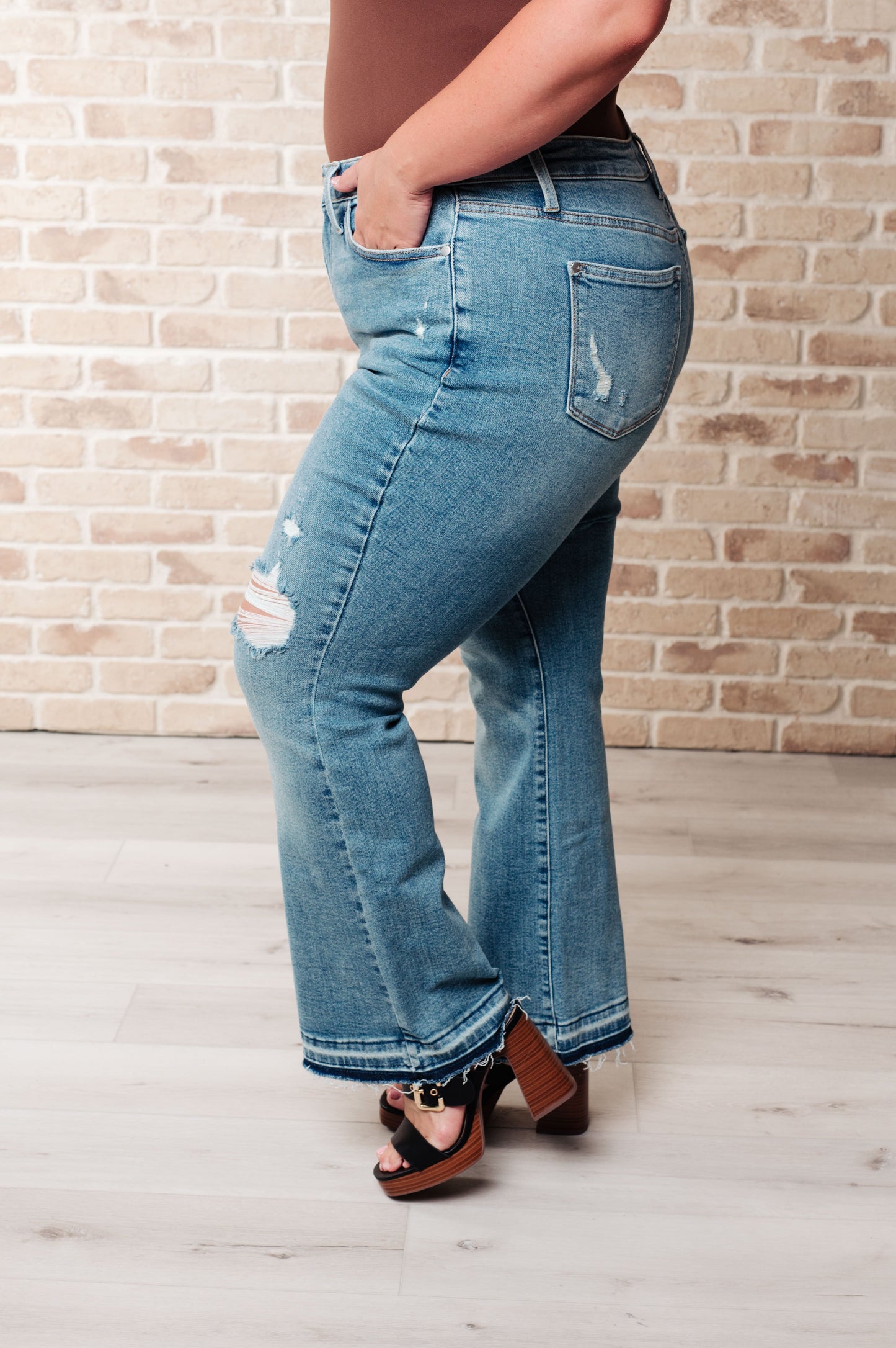 Mid Rise Distressed Bootcut Jeans