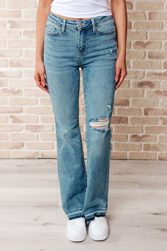 Mid Rise Distressed Bootcut Jeans