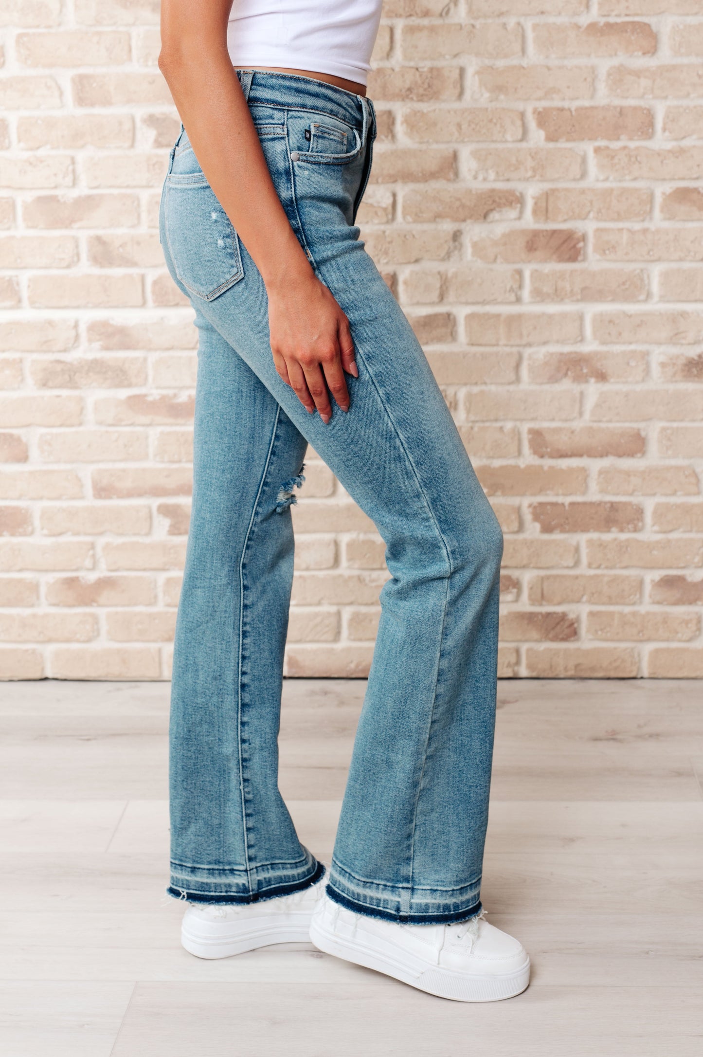 Mid Rise Distressed Bootcut Jeans