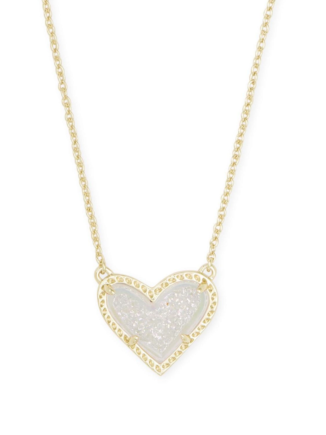 Cream glitter heart-shaped pendant necklace with gold chain on a white background